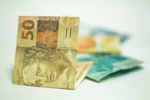Guia completo do crédito consignado do INSS em 2026: taxas por banco, margem, CET, prazos, portabilidade e quando vale a pena